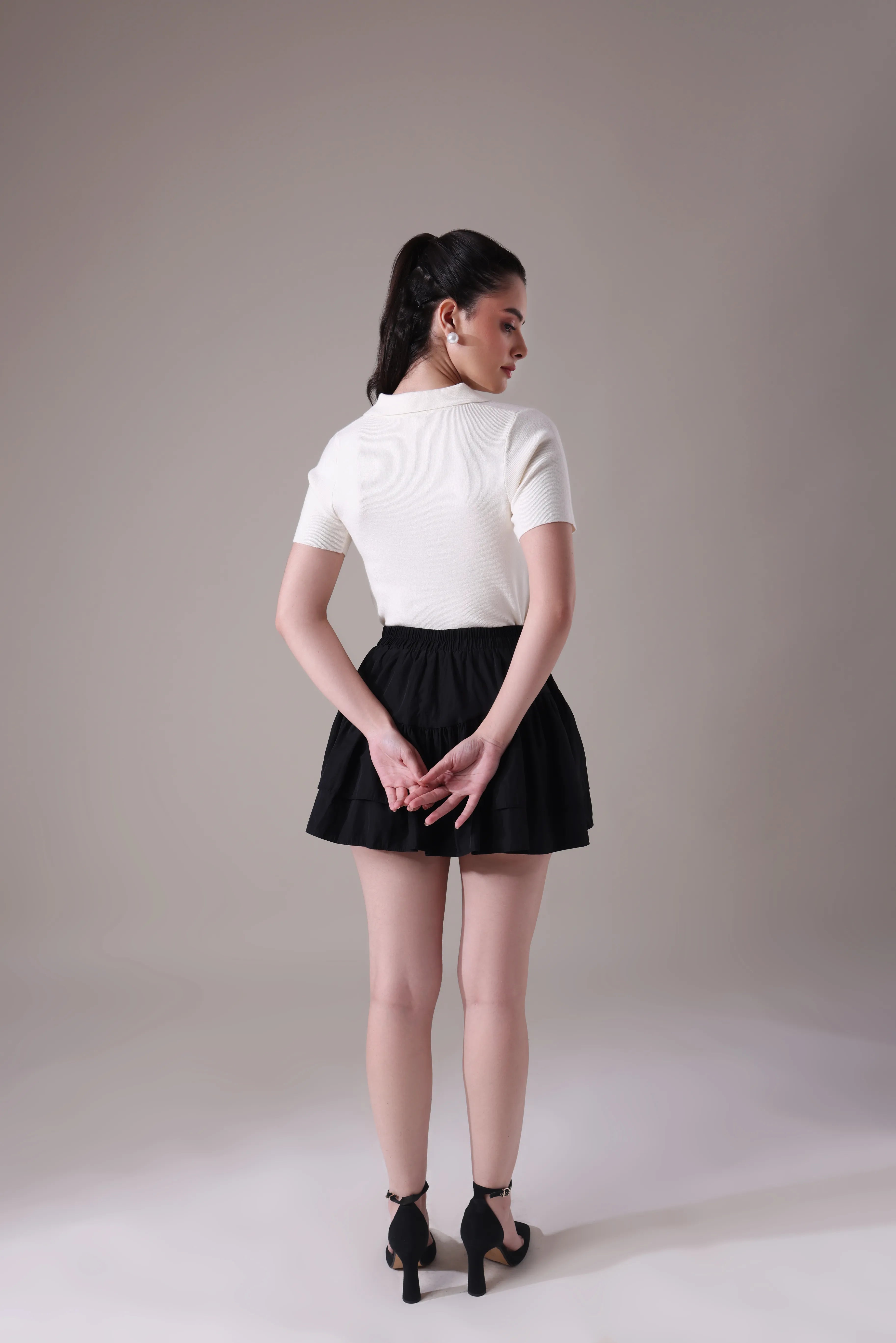 The Etoile Tiered Mini Skirt In Midnight Onyx with Hand-Tied Silk Bow Accents