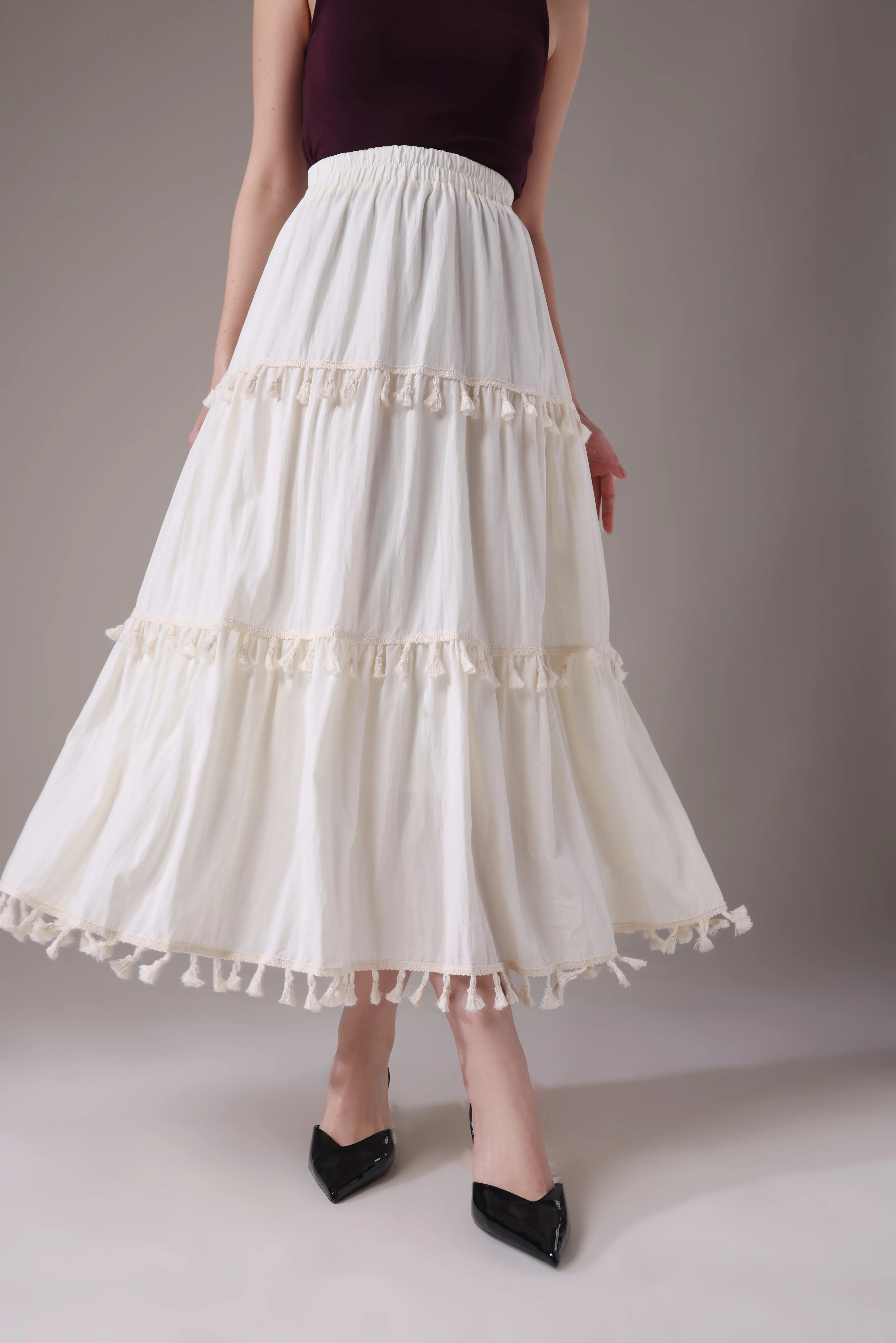 The Elara Tasseled Alabaster Maxi Skirt