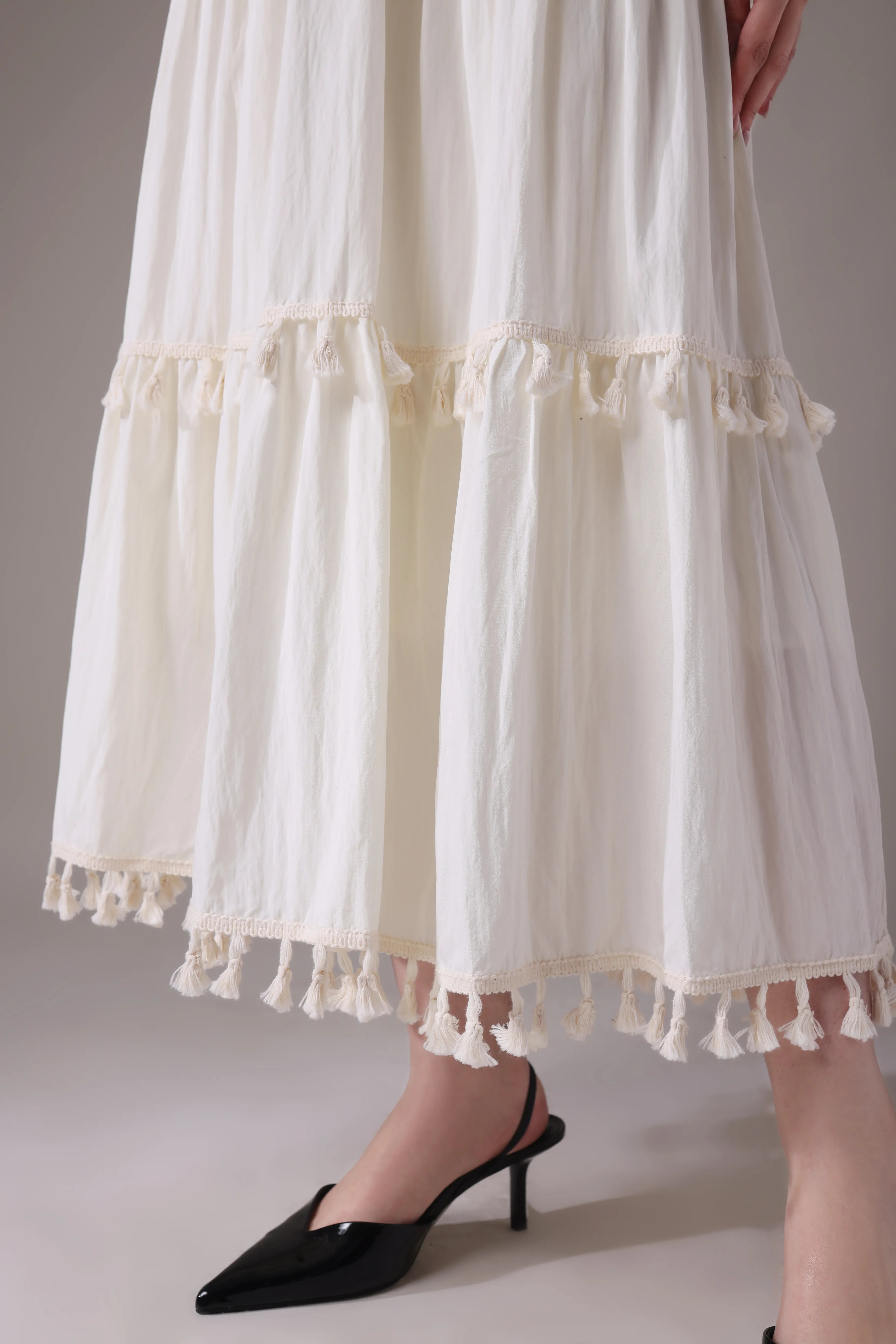 The Elara Tasseled Alabaster Maxi Skirt