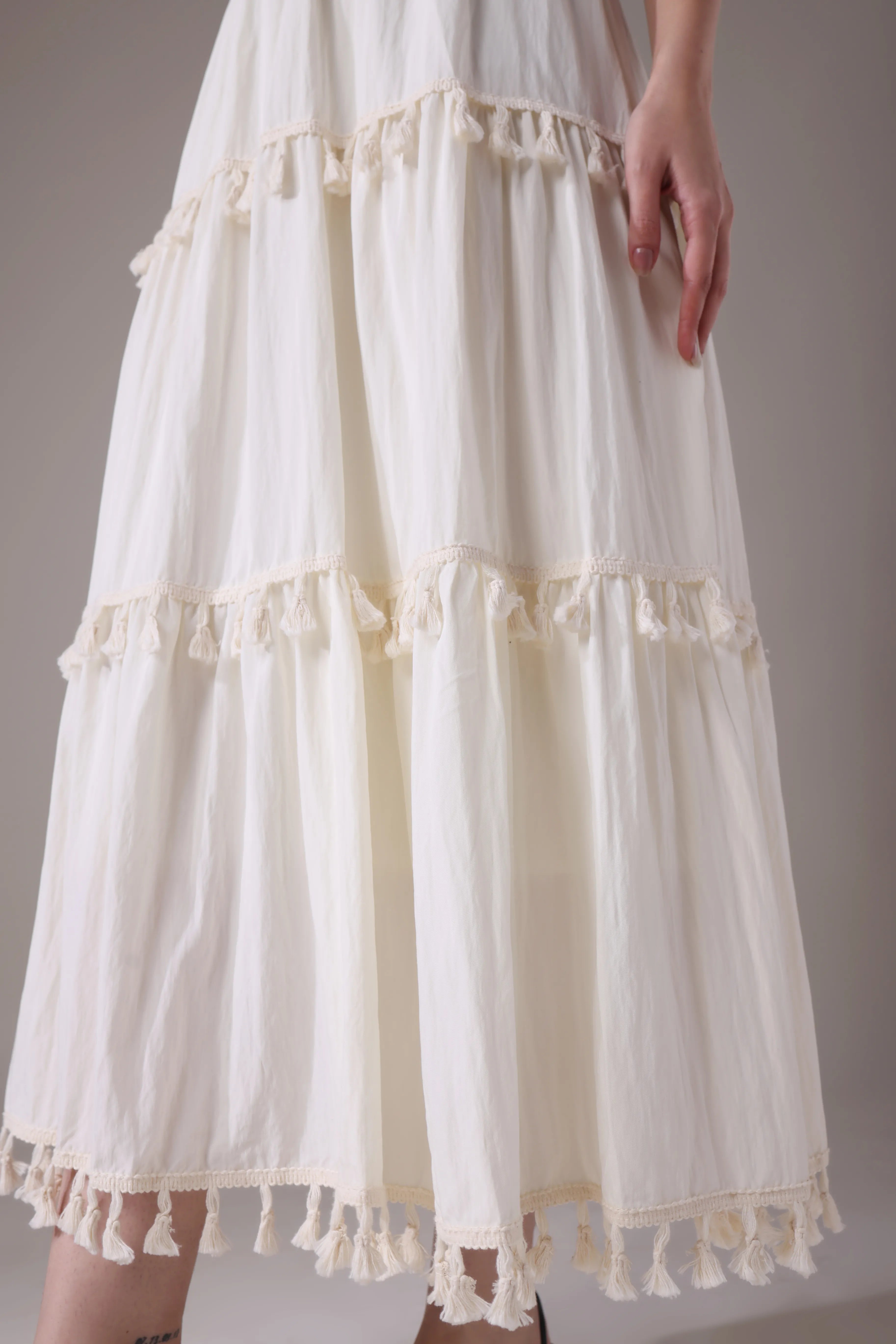 The Elara Tasseled Alabaster Maxi Skirt